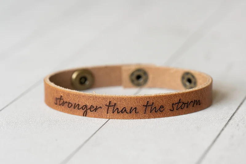 festival bangles for women-Personalized Gift Leather Engraved Bracelet With Snaps | Stronger Than The Storm | Walnut + Antique Brass | Affirmation