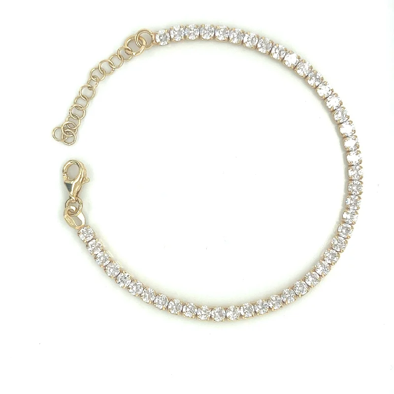 gemstone bangles for women-Golden Tennis Bracelet