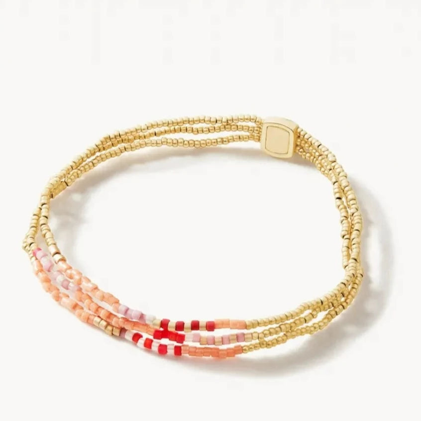 modern charm bangles for women-Triple Bitty Bead Stretch Bracelet -Pink