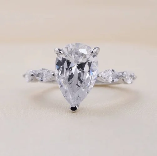 high-quality engagement rings-3.0 Carat Pear Cut Engagement Ring With Marquise Cut Side Stone