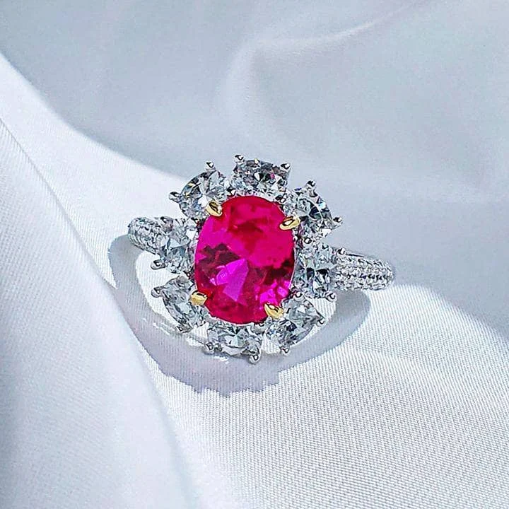 platinum and diamond engagement rings-White Gold Flower Shape Oval Cut Ruby Engagement Ring