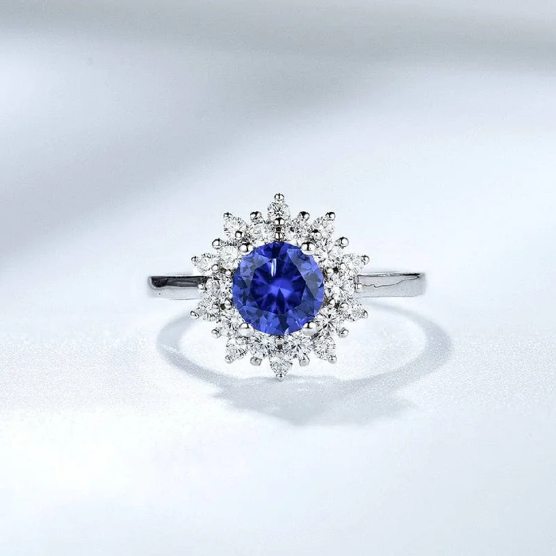 emerald engagement rings-Round Cut Tanzanite 4 Prong Engagement Ring