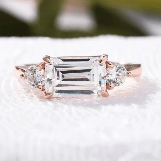 emerald engagement rings-2.5 Carat Emerald Cut Three Stone Engagement Ring